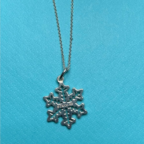 Tiffany & Co. Jewelry - Tiffany & Co. snowflake pendant and 16” Tiffany & Co. silver chain.